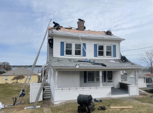 Front Picture of Home Being Shingled