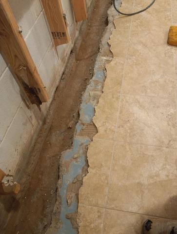 Our team began creating the channel where the drainage system would be installed.