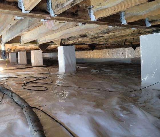 CleanSpace vapor barrier installed to prevent moisture from passing through the ground and SilverGlo thermal wall insulation installed