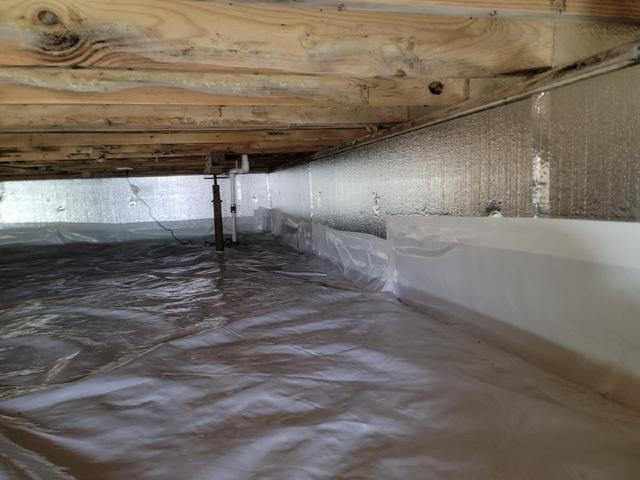 CleanSpace vapor barrier installed to prevent moisture from passing through the ground and SilverGlo thermal wall insulation installed