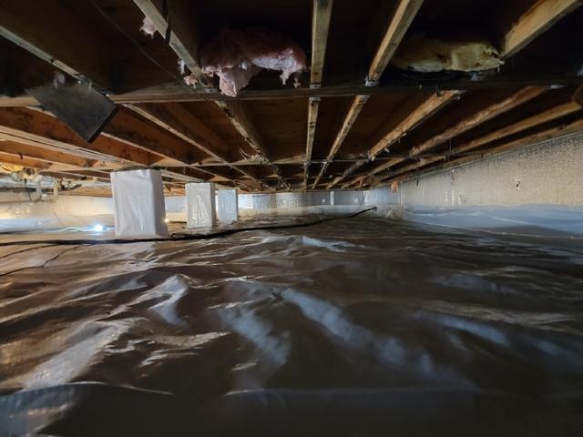 CleanSpace vapor barrier installed to prevent moisture from passing through the ground and SilverGlo thermal wall insulation installed