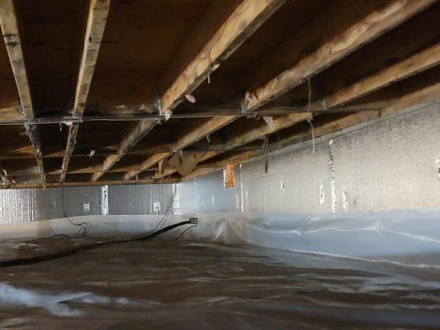 CleanSpace vapor barrier installed to prevent moisture from passing through the ground and SilverGlo thermal wall insulation installed