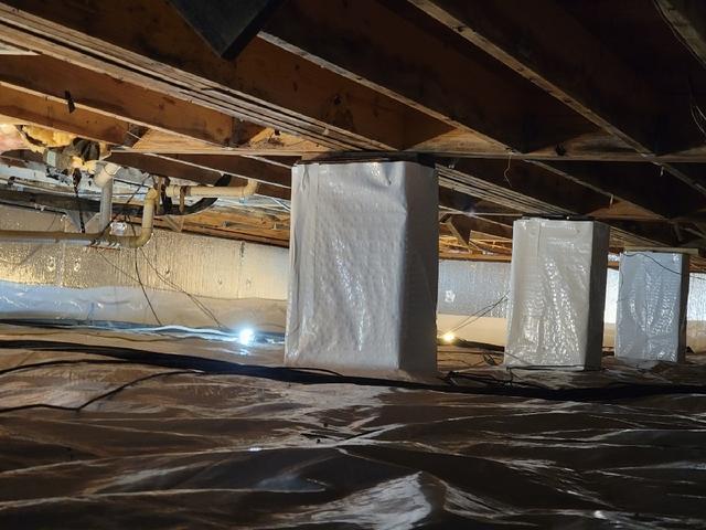 CleanSpace vapor barrier installed to prevent moisture from passing through the ground and SilverGlo thermal wall insulation installed