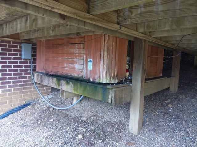 Our customer wanted the hot tub removed, and asked that we protect the supports underneath the deck, as well as the water line that ran right beside the hot tub up to their plants.