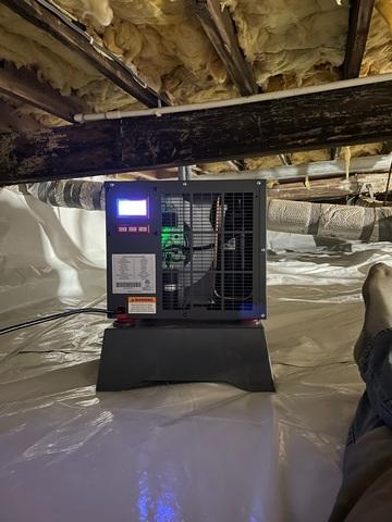 This Sanidry dehumidifier is helping decrease the high moister levels in this crawlspace.