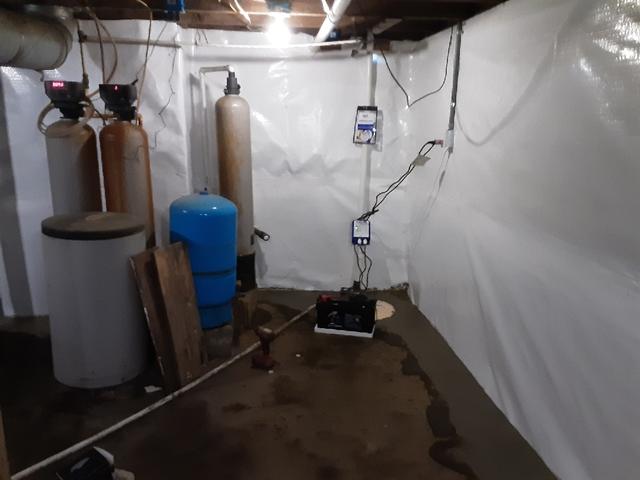 This is another view of the finished basement and the location of the new sump pump.