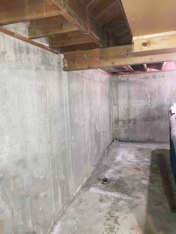 Our customer was suffering from water entering her basement, causing damage to the concrete and surrounding walls as pictured here.