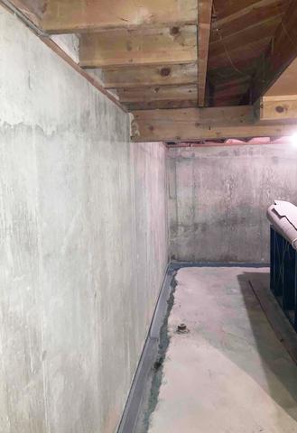 Our crew began the project by jackhammering the concrete surrounding the perimeter of the basement to lay the WaterGuard snugly against the wall.