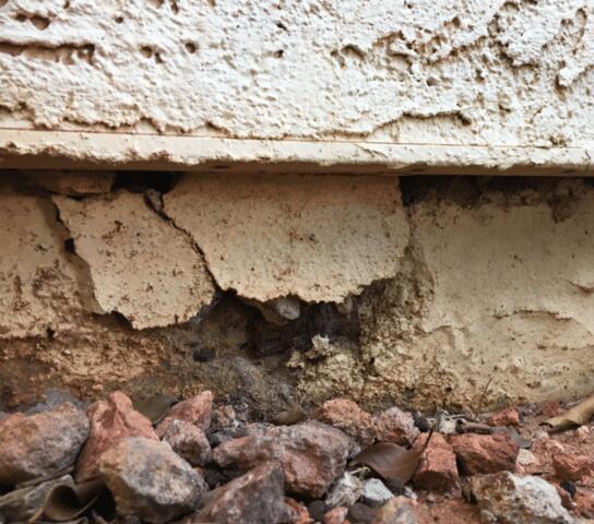 Symptoms of a Failing Stem Wall: Spalling Concrete