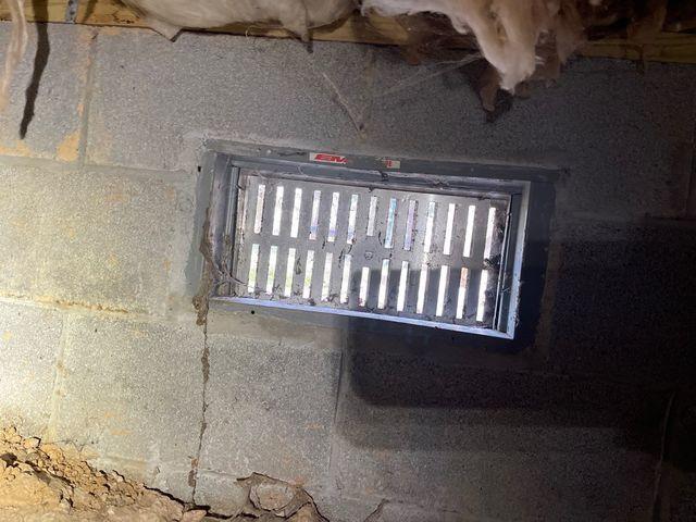 This open vent was allowing uncontrolled air to move in and out of the crawl space.