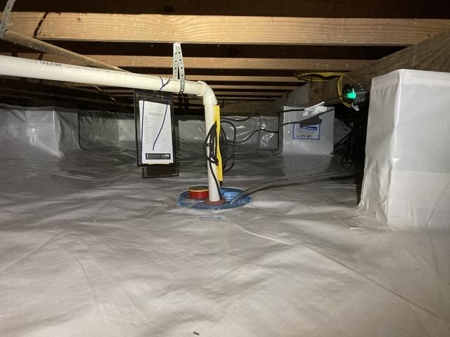 We ended up installing 2 pumps and 2 dehumidifiers because of the size of this home. They will work together to keep the crawlspace dry and the atmosphere clean.