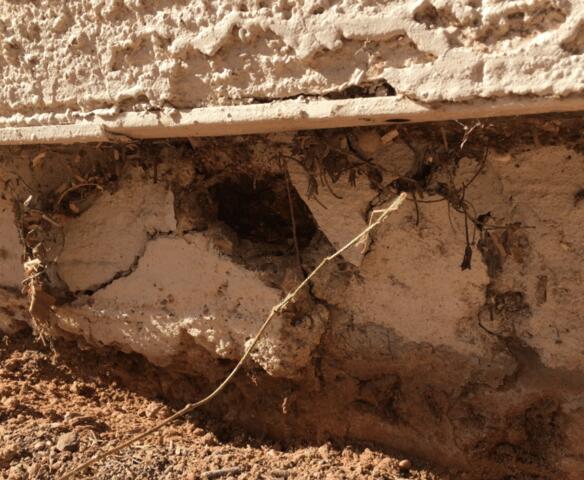 Symptoms of Corrosion in Stem Wall: Spalling Concrete