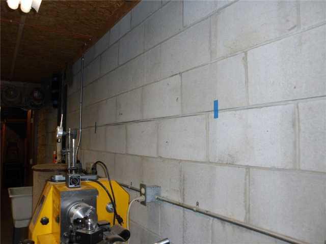 Cracked Cinder Block Foundation Wall - Before