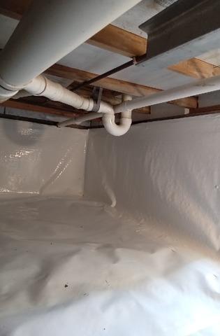 CleanSpace vapor barrier installed on the crawl space ground and walls and provides a dry usable storage space for the homeowners