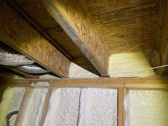 We removed all existing fiberglass batts from the floor joists of this crawl space, for the homeowner had planned to move the insulation to the foundation walls, as we had proposed. We would also advise using our antimicrobial solutions to eliminate mold and mildew growth on all the floor joists, however, the homeowners chose not to.