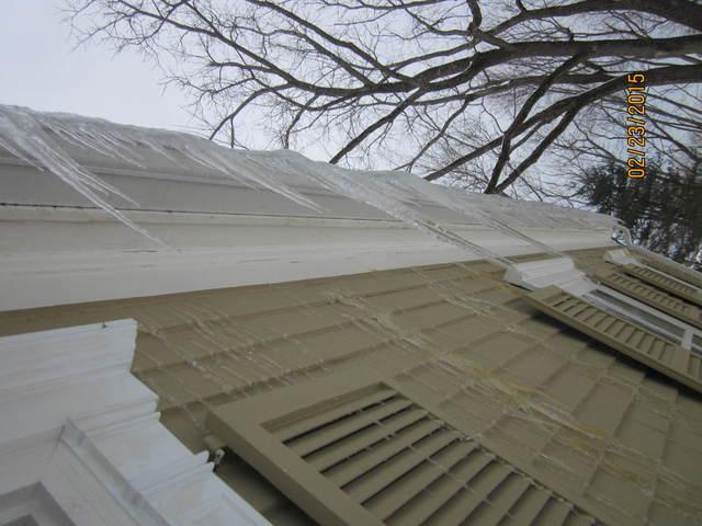 When melted snow cannot get through or over gutters clogged with ice, it may run down behind the gutters and then re-freezes, forming icicles on the siding.