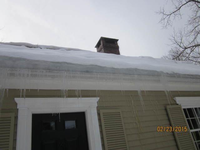 With nowhere to go, the melted snow backs up behind the ice dam and starts pushing up under the shingles.