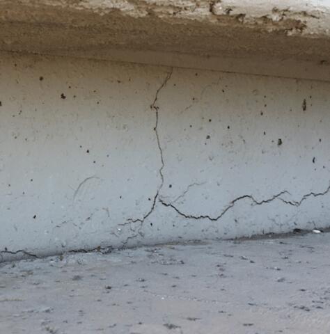Symptoms of Corrosion in a Stem Wall: vertical Concrete Cracks