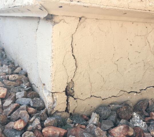 Symptoms of Corrosion in a Stem Wall: Spalling Concrete