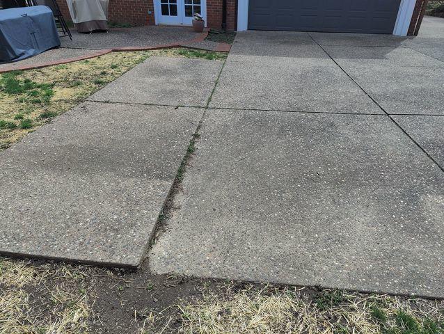 This concrete is uneven, creating a tripping hazard.