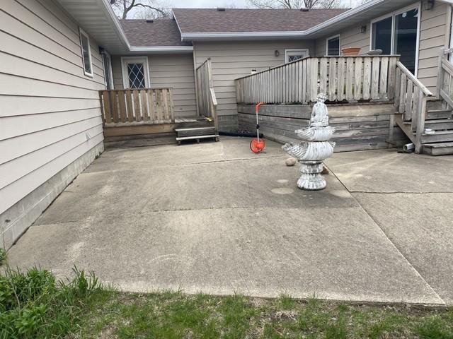 Several areas throughout the patio that are cracked and settling