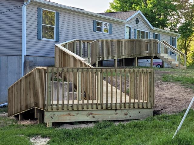 Treated wood ramp with stairs and landing