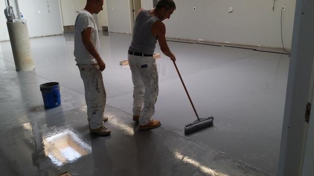 Jim and Rob installing 100% solids epoxy floor