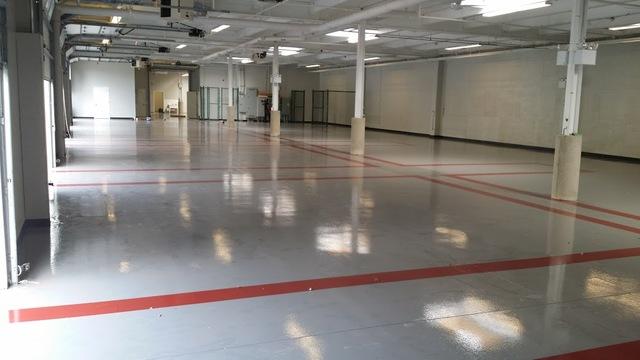 Red lines installed on the floor to outline the each bay