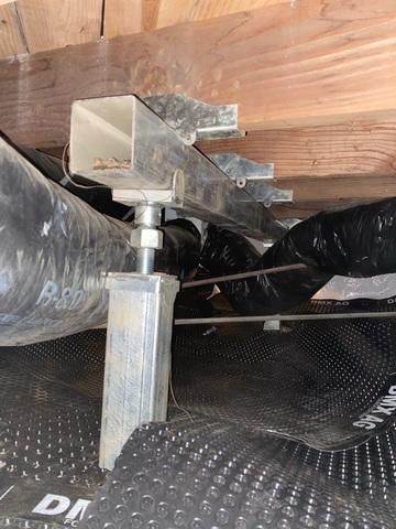 Finally, our crew installed SmartJacks. They are steel supports that balance the foundation of the crawlspace, lifting it to its original position. They can be adjusted so the home never shifts out of place.