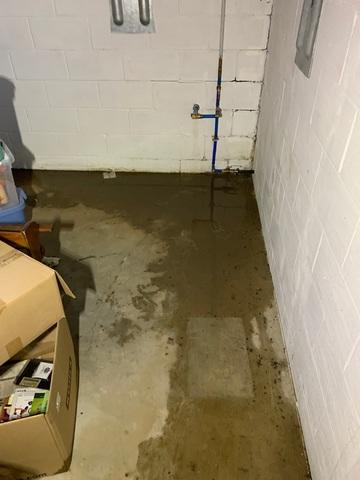 This homeowner was having issues with water flooding into the northwest corner of their basement. This was a new problem, however you can see the small cracks on the north wall that water was seeping in through.