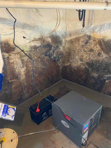 To remove moisture from the air and keep the space dry, a SaniDry Sedona dehumidifier was installed and drains into the sump pump system.