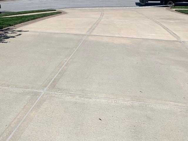 Leveled and Sealed Driveway