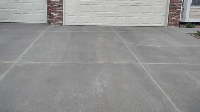 Lifted, Leveled, and Sealed Driveway