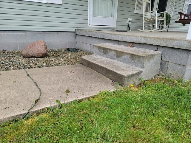 The concrete sinkage was damaging the steps that lead up to this Cortland, Ohio home