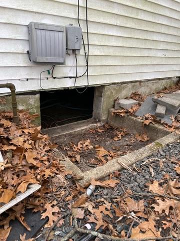 As you can see, the crawl space is not properly sealed off from the outside elements.