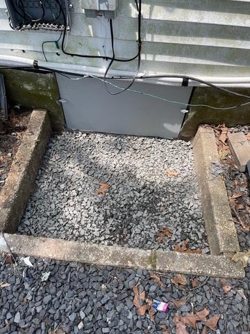 Our crew installed our crawl space entry door to prevent outside elements from entering the crawl space.