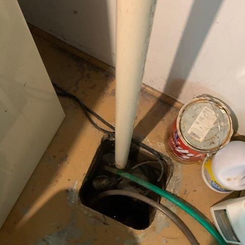 The homeowners had a drainage system that was not working. The sump pump was buried and not functioning, so water would flood in the corners of the basement with no where to go on rainy days.