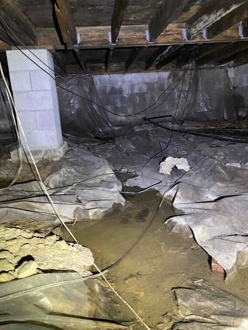 Before - Dirty and Wet Crawl Space