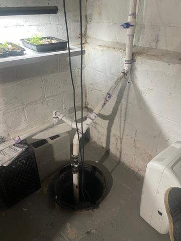 This old sump pump was not operating properly, so we installed a new one.