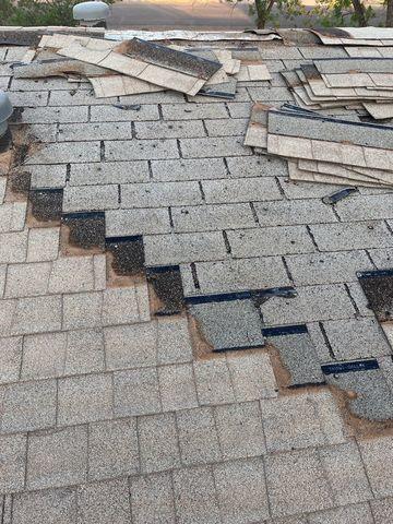 <p>During the tear-off process, we see that the bottom layer of shingles is in better shape than the top. This is still incorrect roofing, though, so both layers must be removed in order to properly re-shingle the roof.</p>