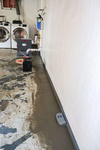 Full Waterproofing System Installed to Keep Basement Clean and Dry