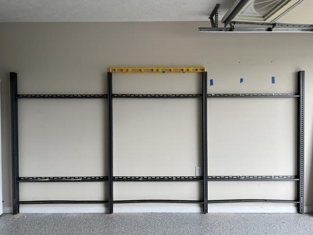 This wall space is going to be transformed with awesome storage solutions!