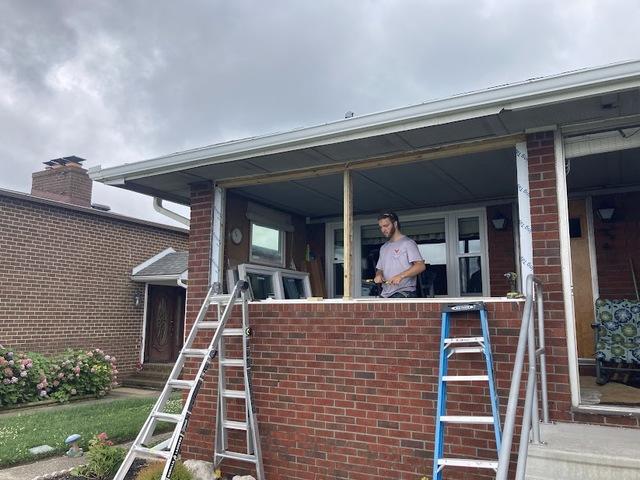 Here you can see Liam prepping to install the new windows.