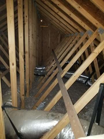 HVAC ducts passing through a hot attic