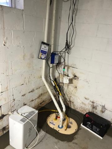 Here is a photo of the TripleSafe Sump Pump and its backup battery. TripleSafe provides three levels of water protection, keeping your basement dry and healthy.