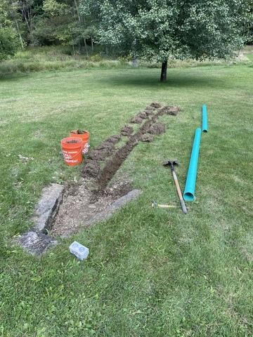 Downspout line extension with LawnScape Outlet