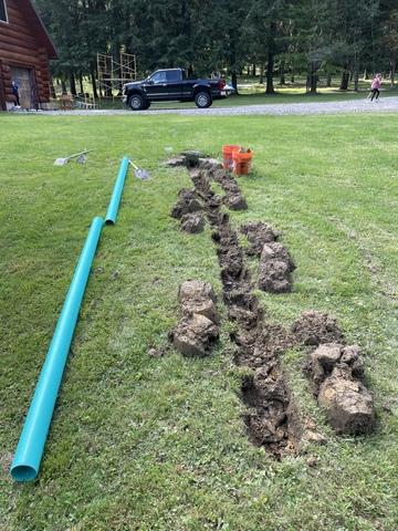 Downspout line extension with LawnScape Outlet