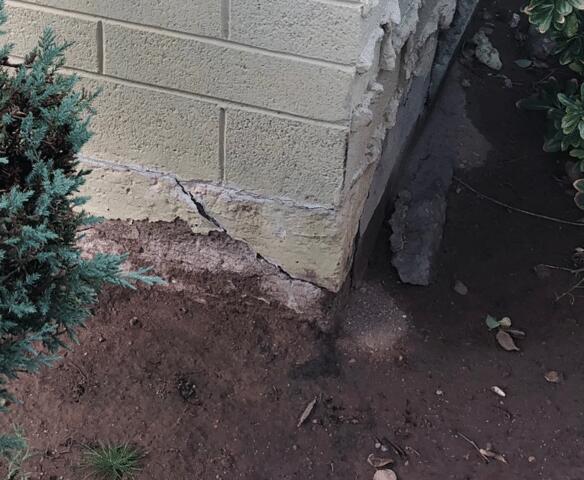 Symptoms of Stem Wall Failure: Spalling Concrete