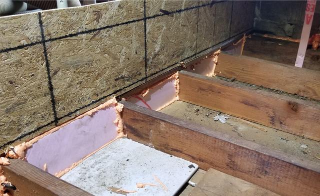 In order to keep the insulation in place we build dams along the attic floors.  Any flooring or storage spaces we block off each cavity or empty joist bay with foam to seal it in place with ZypFoam.