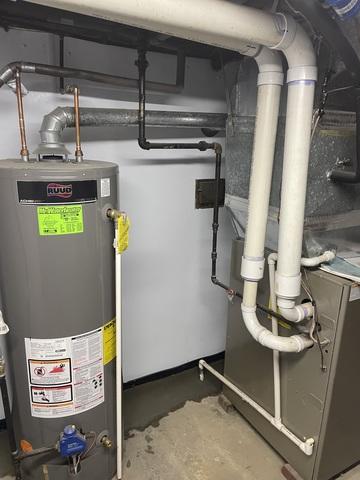 We integrated the HVAC condensate line into the system rather than an awkward pipe laying on the floor to a drain in the middle of the floor.